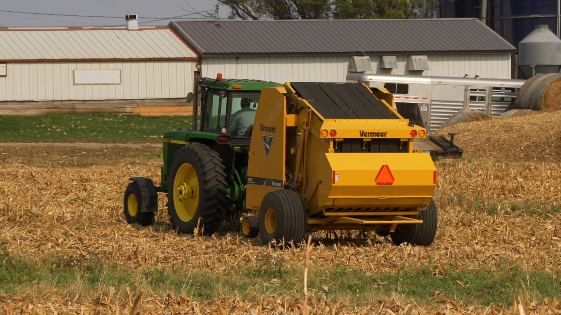 bale cornstalks after cut and chopped for bedding in cattle operation bale cornstalks after cut and chopped for bedding in cattle operation
